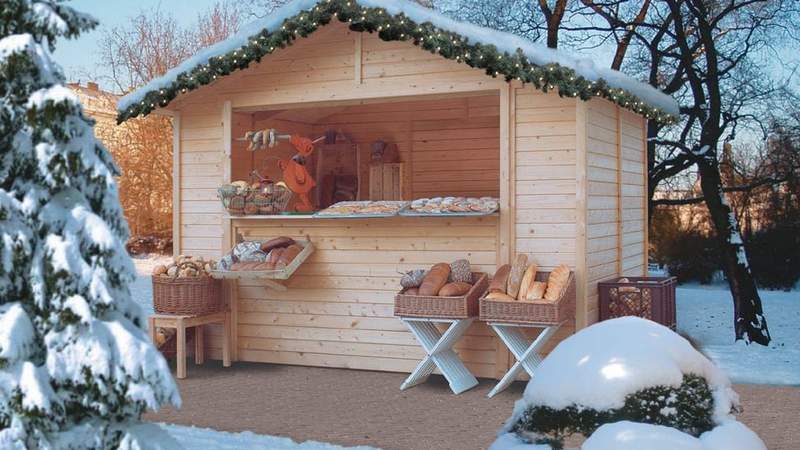 Winterlounge mit Weihnachtsmarkthütte