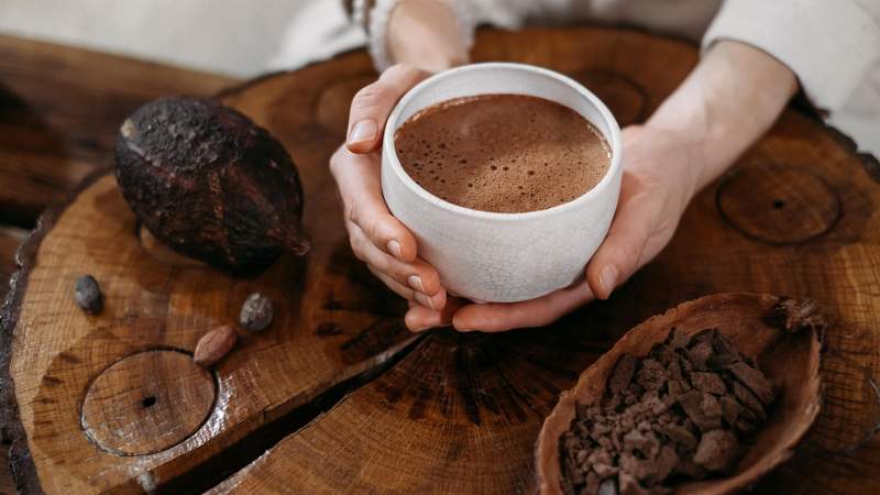 Giving cup on ceremony, cozy cafe