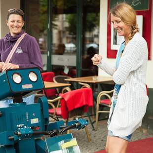 Sprechender Roboter auf seinem Fahrrad