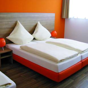 Hotelzimmer Orange Hotel und Apartments