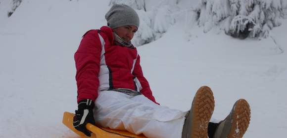 Schlittenfahren Schneeschuhwandern