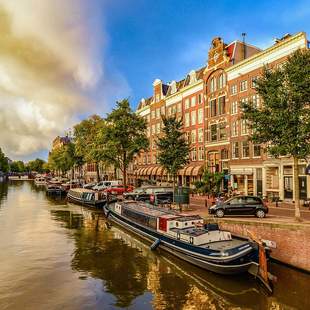 Amsterdam mit Grachten Hafenstadt Amsterdam