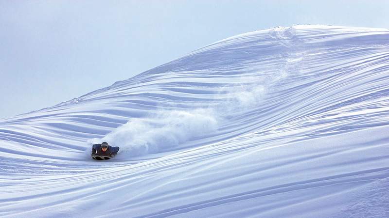 Schneeschuhwanderung mit Airboard Rodeln